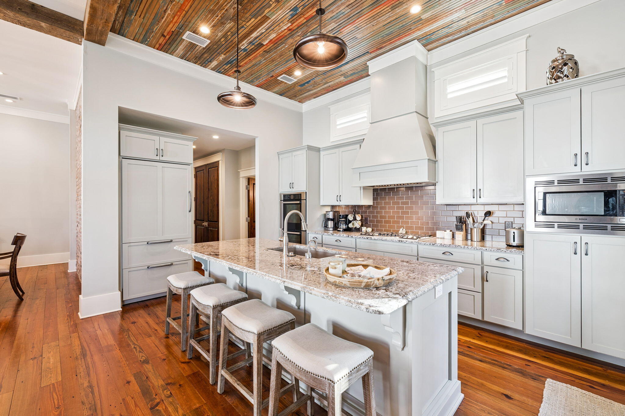69 Bennett Santa Rosa Beach, FL 32459 - Photo 3 of 58 a large kitchen with kitchen island granite countertop a sink and cabinets