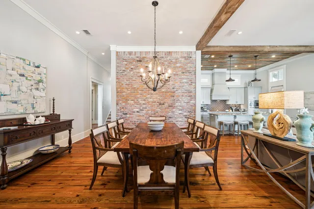 a kitchen with stainless steel appliances granite countertop a stove and a refrigerator