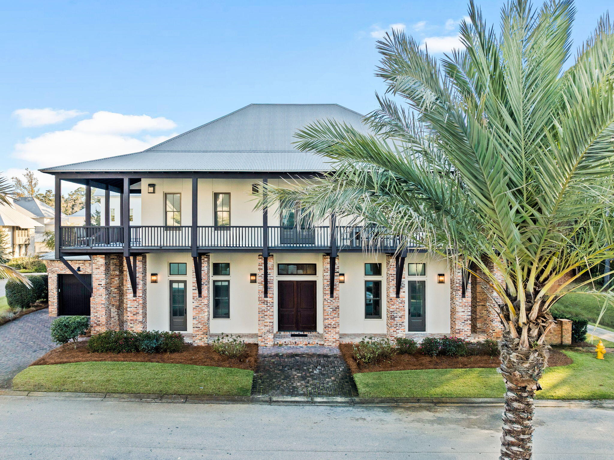 69 Bennett Santa Rosa Beach, FL 32459 - Photo 42 of 58 a front view of a house with a garden