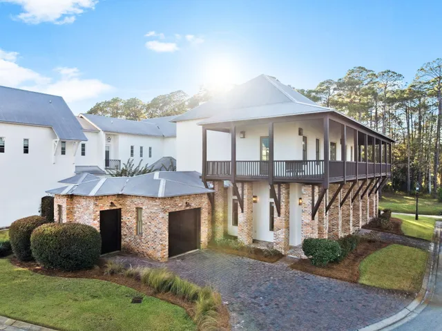 a view of a swimming pool with an outdoor seating
