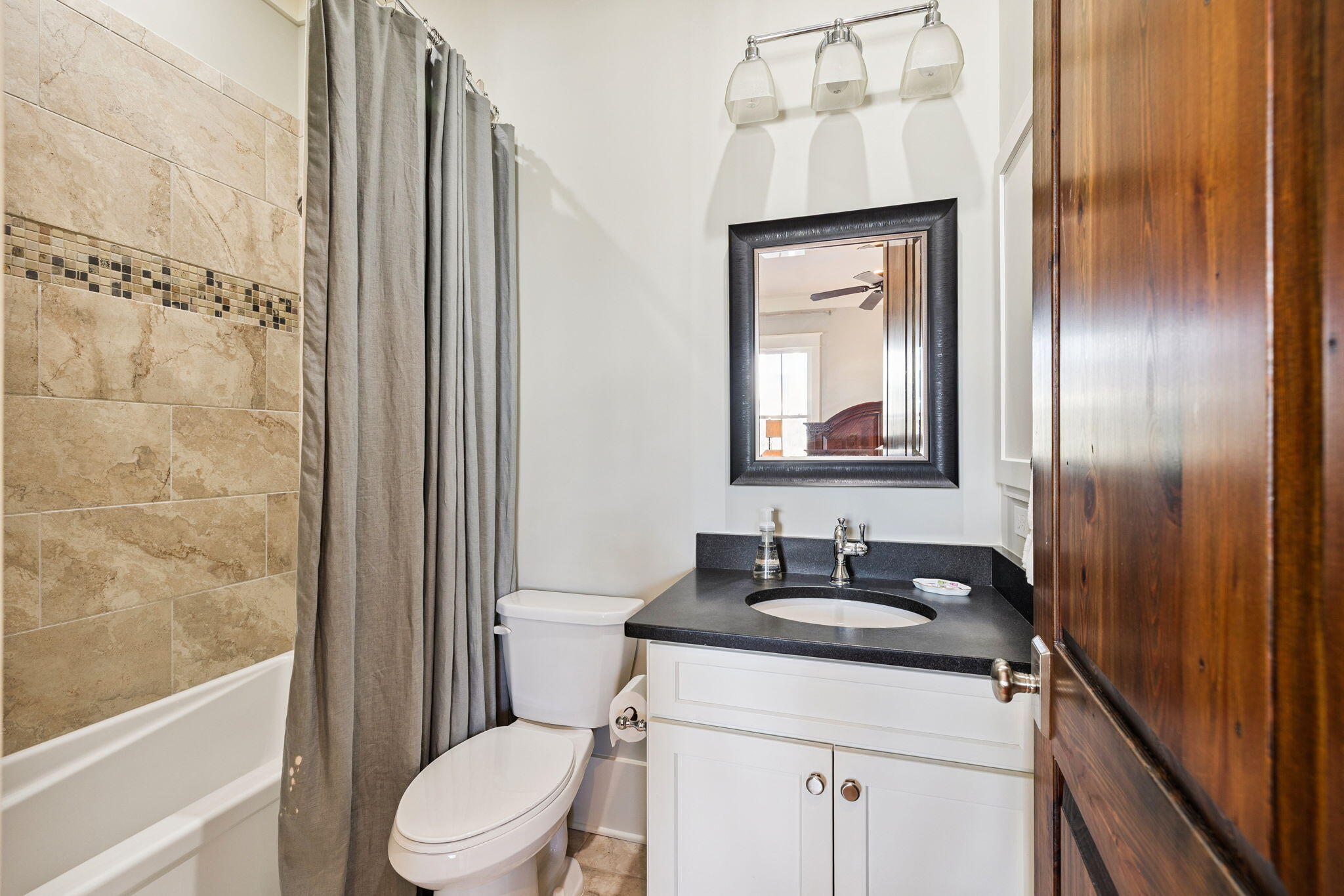 69 Bennett Santa Rosa Beach, FL 32459 - Photo 5 of 58 a bathroom with a granite countertop sink toilet and shower