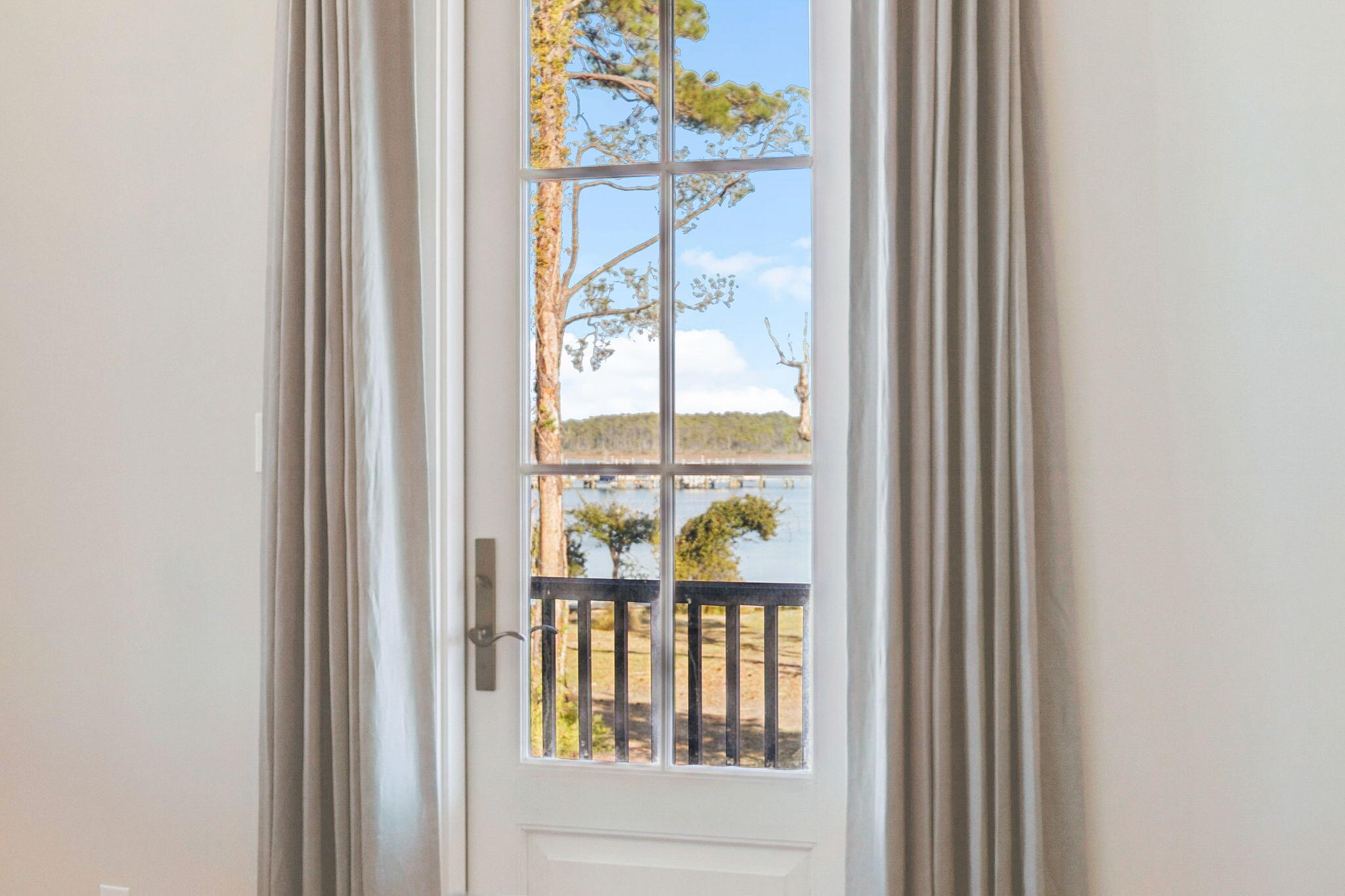 69 Bennett Santa Rosa Beach, FL 32459 - Photo 7 of 58 a view of a room that has a large window and front door
