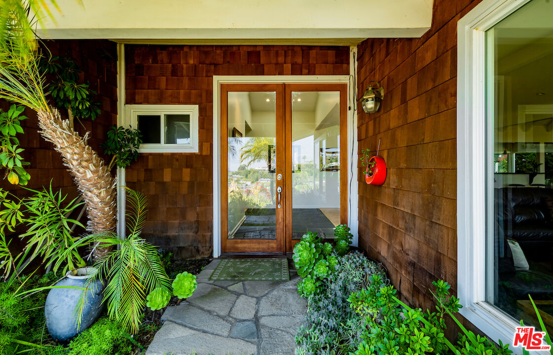 1336 Las Canoas Road Pacific Palisades, CA 90272 - Photo 4 of 37 a view of a door of the house