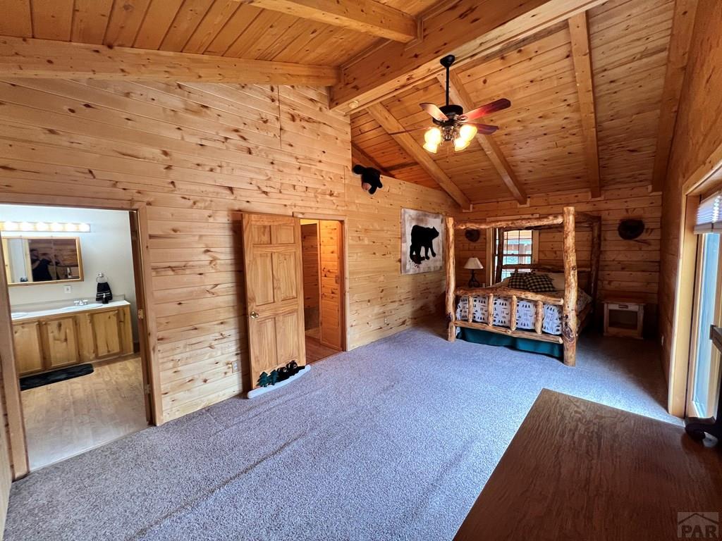 105 St Charles Avenue Rye, CO 81069 - Photo 14 of 35 a view of an empty room with furniture and a ceiling fan