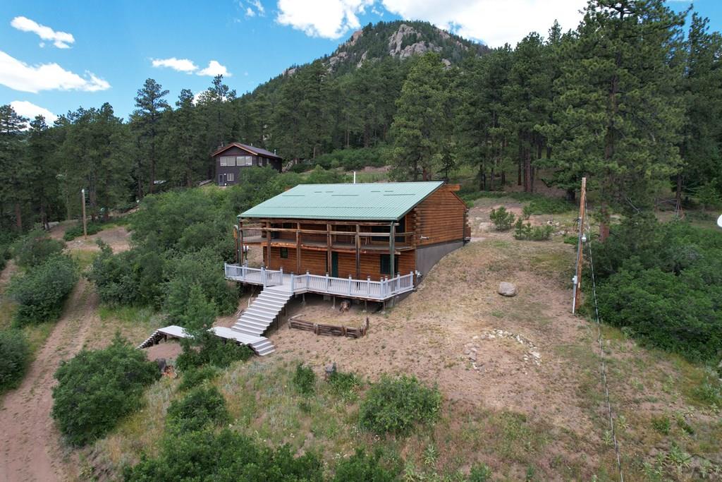 105 St Charles Avenue Rye, CO 81069 - Photo 2 of 35 an aerial view of a house with a yard