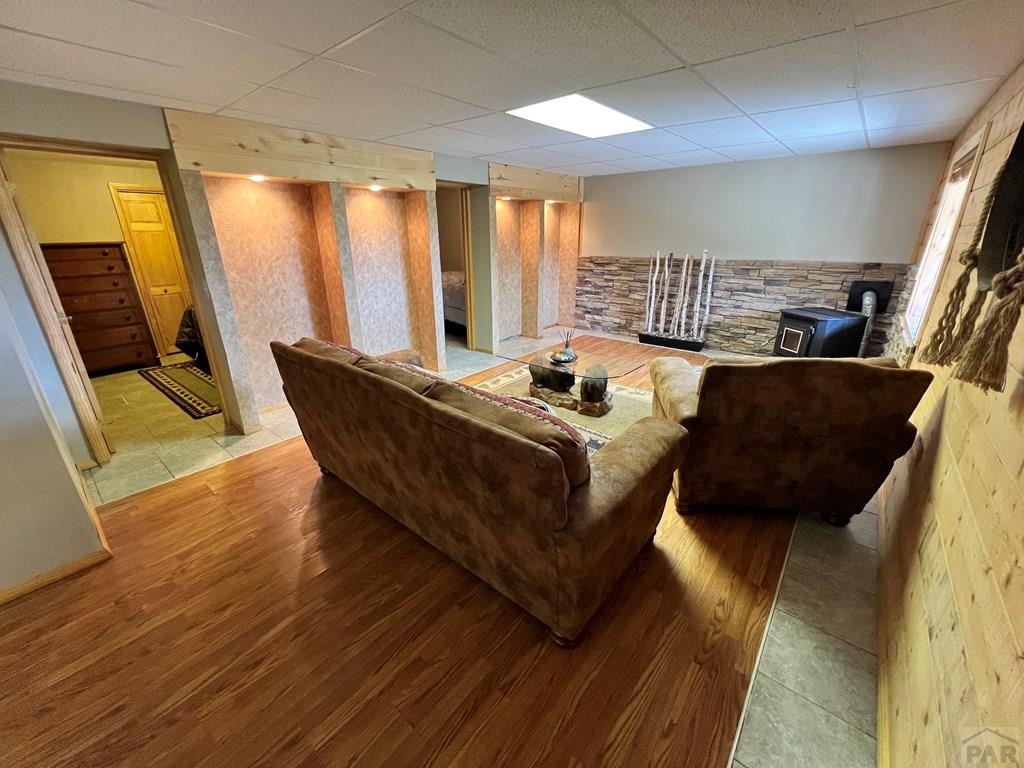 105 St Charles Avenue Rye, CO 81069 - Photo 22 of 35 a living room with furniture and a large window
