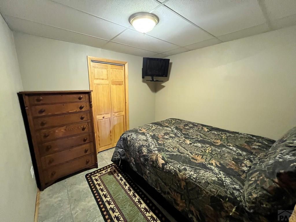 105 St Charles Avenue Rye, CO 81069 - Photo 23 of 35 a bedroom with a bed and furniture