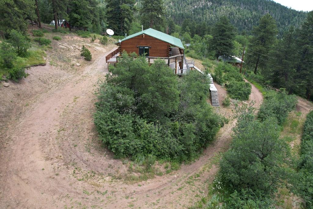 105 St Charles Avenue Rye, CO 81069 - Photo 28 of 35 a view of a dry yard with large trees