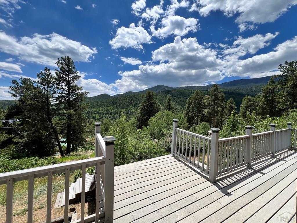 105 St Charles Avenue Rye, CO 81069 - Photo 33 of 35 a view of a balcony with wooden floor