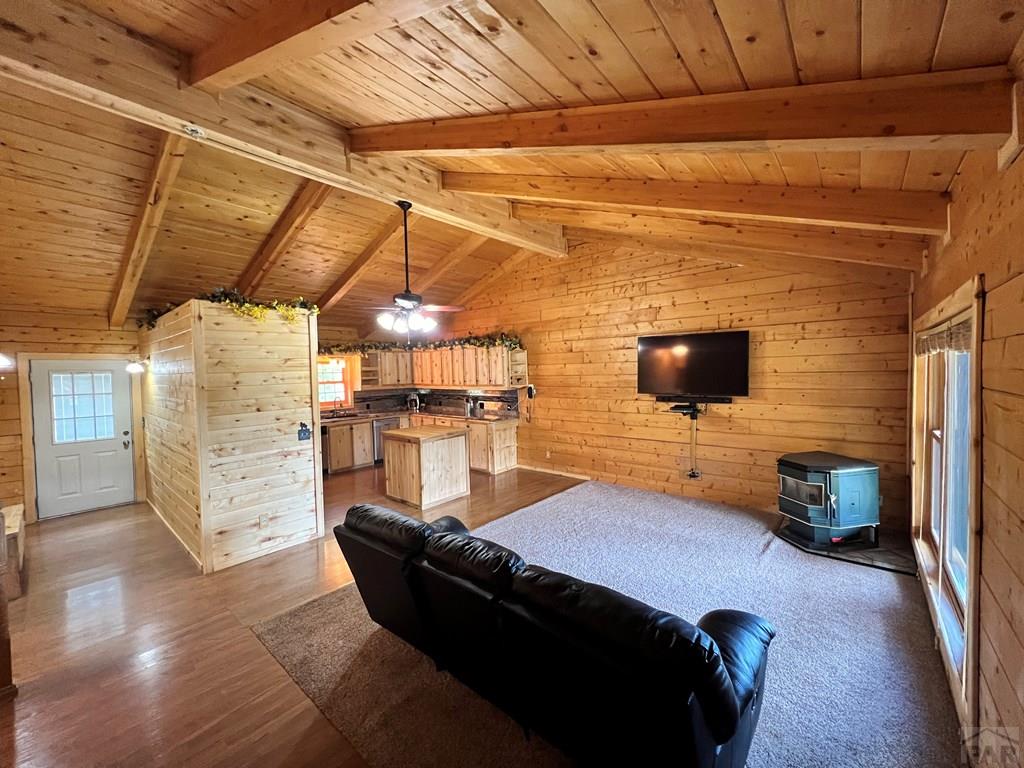105 St Charles Avenue Rye, CO 81069 - Photo 7 of 35 a living room with furniture and a flat screen tv