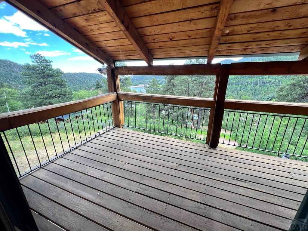 105 St Charles Avenue Rye, CO 81069 - Photo 8 of 35 a view of balcony with wooden floor