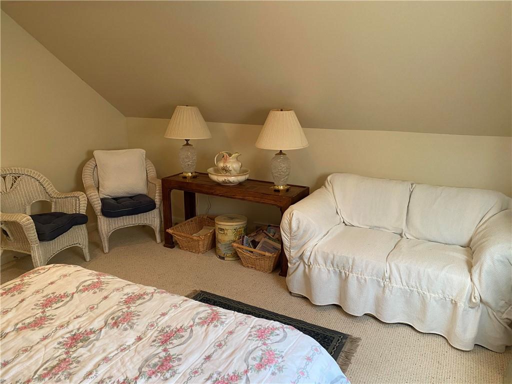 595 Golf Course Road Aliquippa, PA 15001 - Photo 18 of 21 a bedroom with a bed and chair