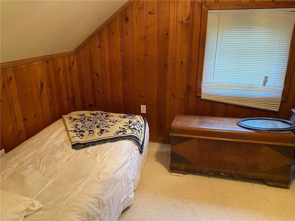 595 Golf Course Road Aliquippa, PA 15001 - Photo 19 of 21 a bedroom with a bed and a dresser