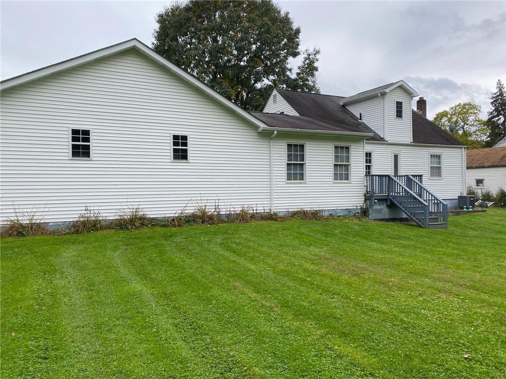 595 Golf Course Road Aliquippa, PA 15001 - Photo 3 of 21 a view of a backyard with a garden
