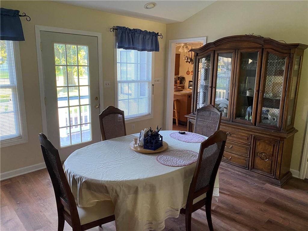 595 Golf Course Road Aliquippa, PA 15001 - Photo 10 of 21 a view of a dining room with furniture window and wooden floor