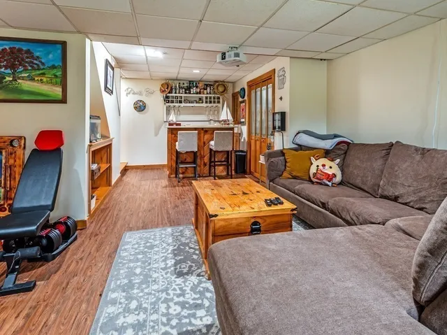 a dinning table and chairs in a room