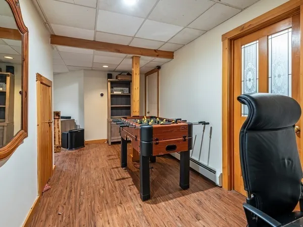 a backyard of a house with a yard and outdoor seating