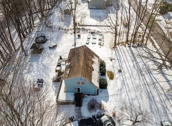 a view of roof deck with patio