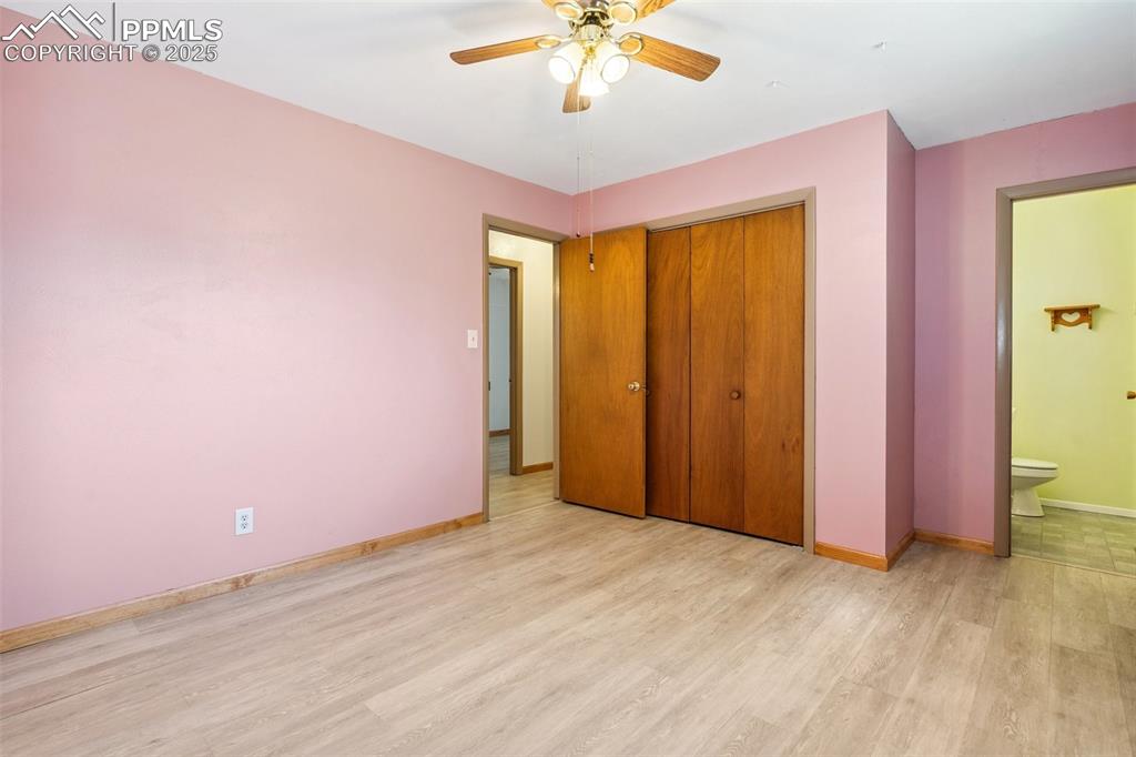 3709 Anemone Circle Colorado Springs, CO 80918 - Photo 23 of 32 a view of a livingroom with a chandelier fan