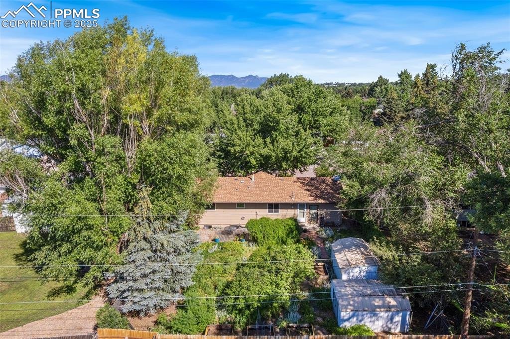 3709 Anemone Circle Colorado Springs, CO 80918 - Photo 5 of 32 an aerial view of a house with yard and outdoor seating
