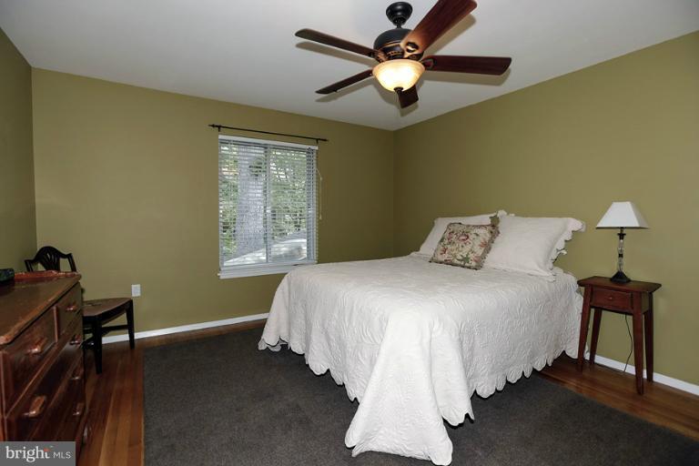 11013 Ring Road Reston, VA 20190 - Photo 11 of 28 3rd BR with Hardwood, Ceiling Fan & Walk-In Closet