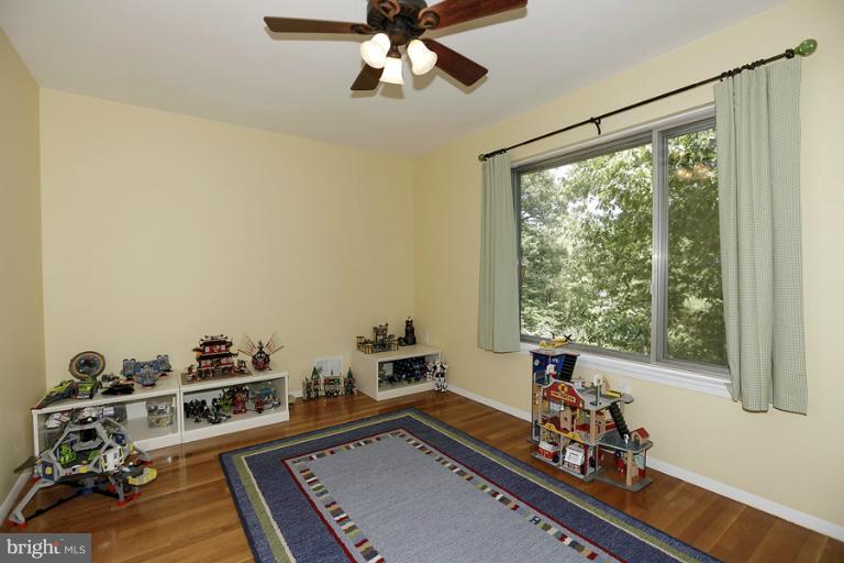 11013 Ring Road Reston, VA 20190 - Photo 18 of 28 2nd BR with Hardwood, Ceiling Fan & Walk-In Closet