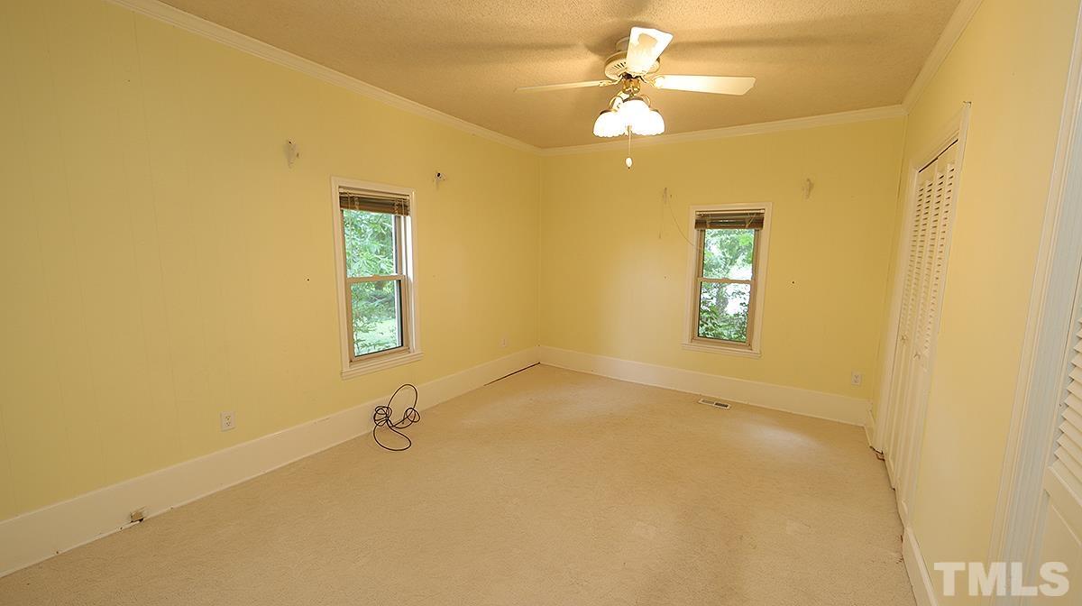 1390 Sanders Road Benson, NC 27504 - Photo 10 of 22 a view of a livingroom with a window