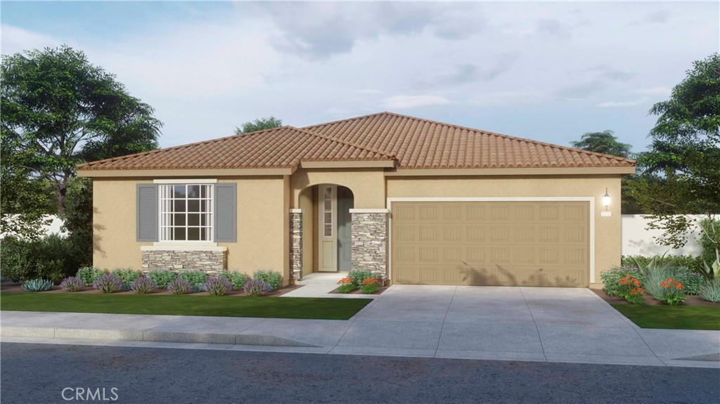 30934 Campania Road Highland, CA 92346 - Photo 18 of 19 a front view of a house with a garden