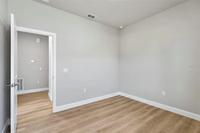 a view of a room with racks on the wall