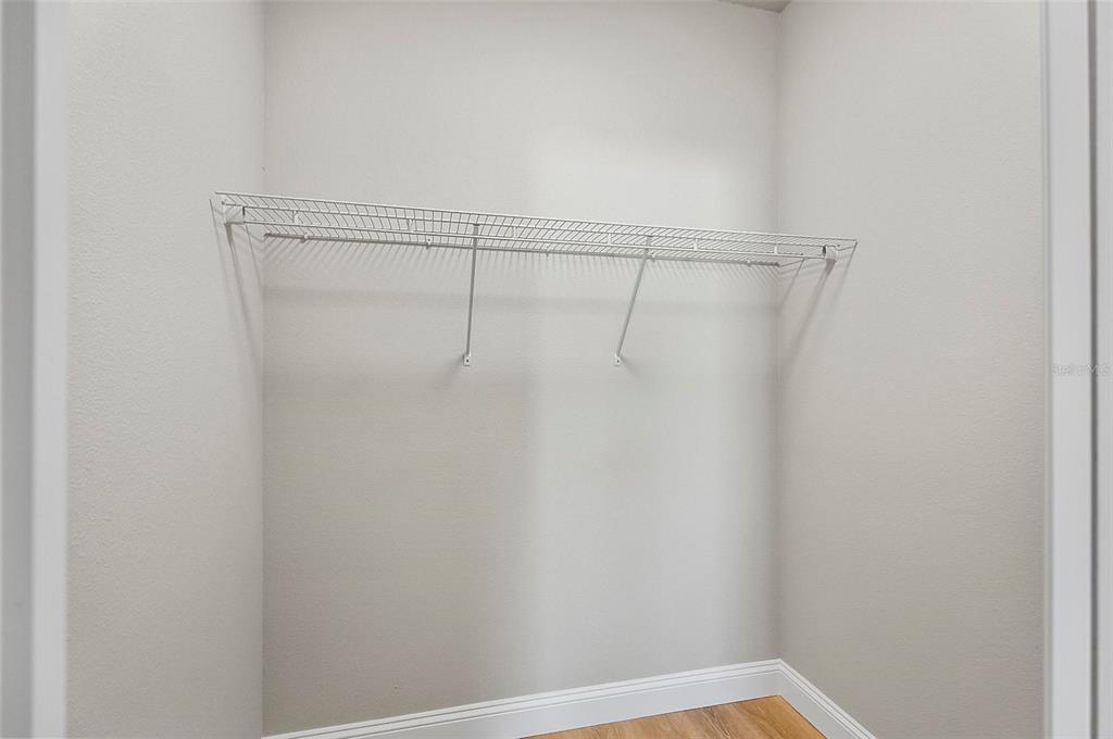 43 Eton Lane, Unit A Palm Coast, FL 32164 - Photo 18 of 78 a view of a room with racks on the wall