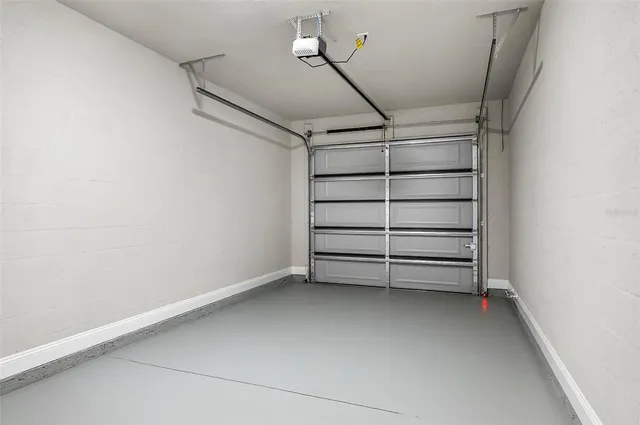 a kitchen with a sink and a stove top oven