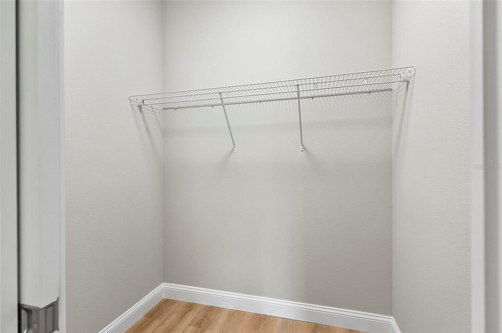 43 Eton Lane, Unit A Palm Coast, FL 32164 - Photo 52 of 78 a view of a room with racks on the wall