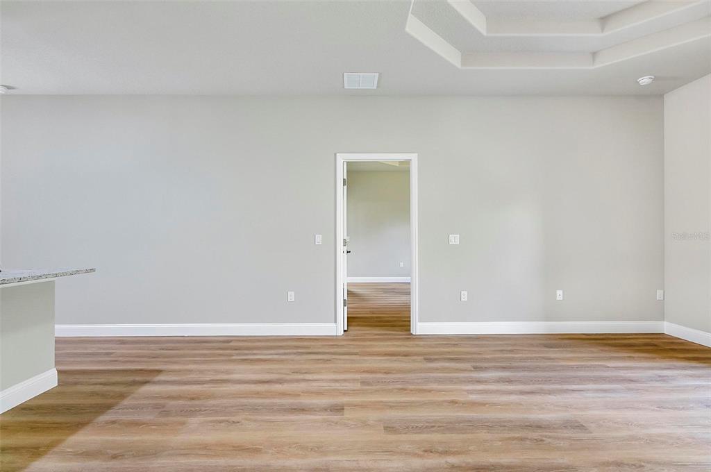 43 Eton Lane, Unit A Palm Coast, FL 32164 - Photo 57 of 78 a view of room with wooden floor