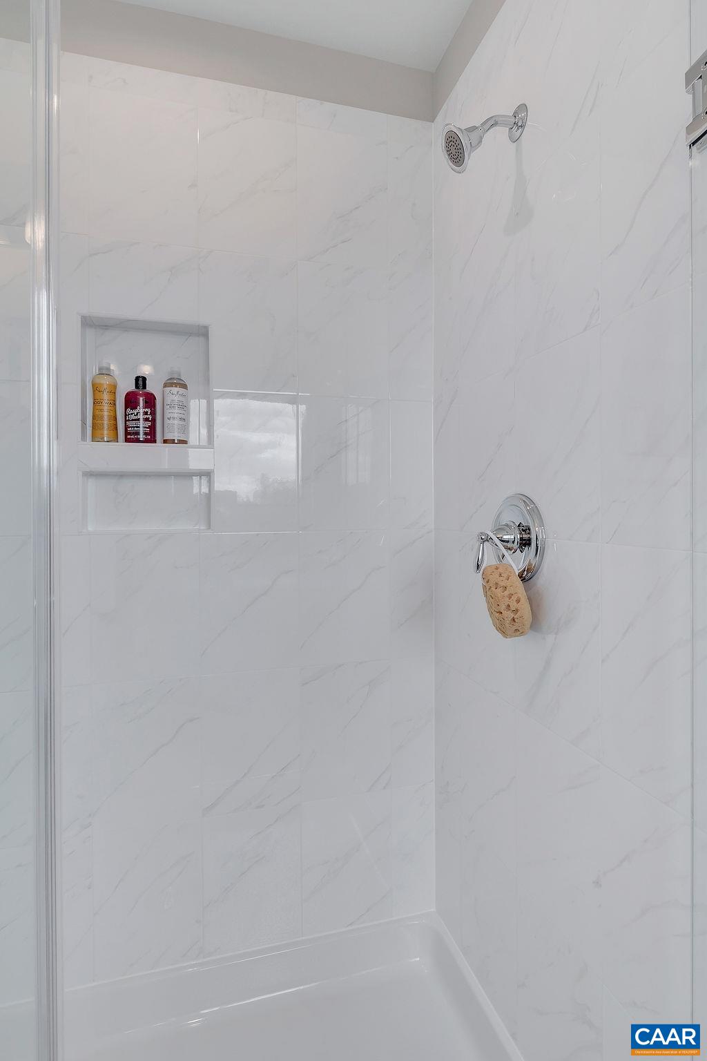 3157 Horizon Road Charlottesville, VA 22902 - Photo 19 of 28 a white bath tub sitting next to a white wall