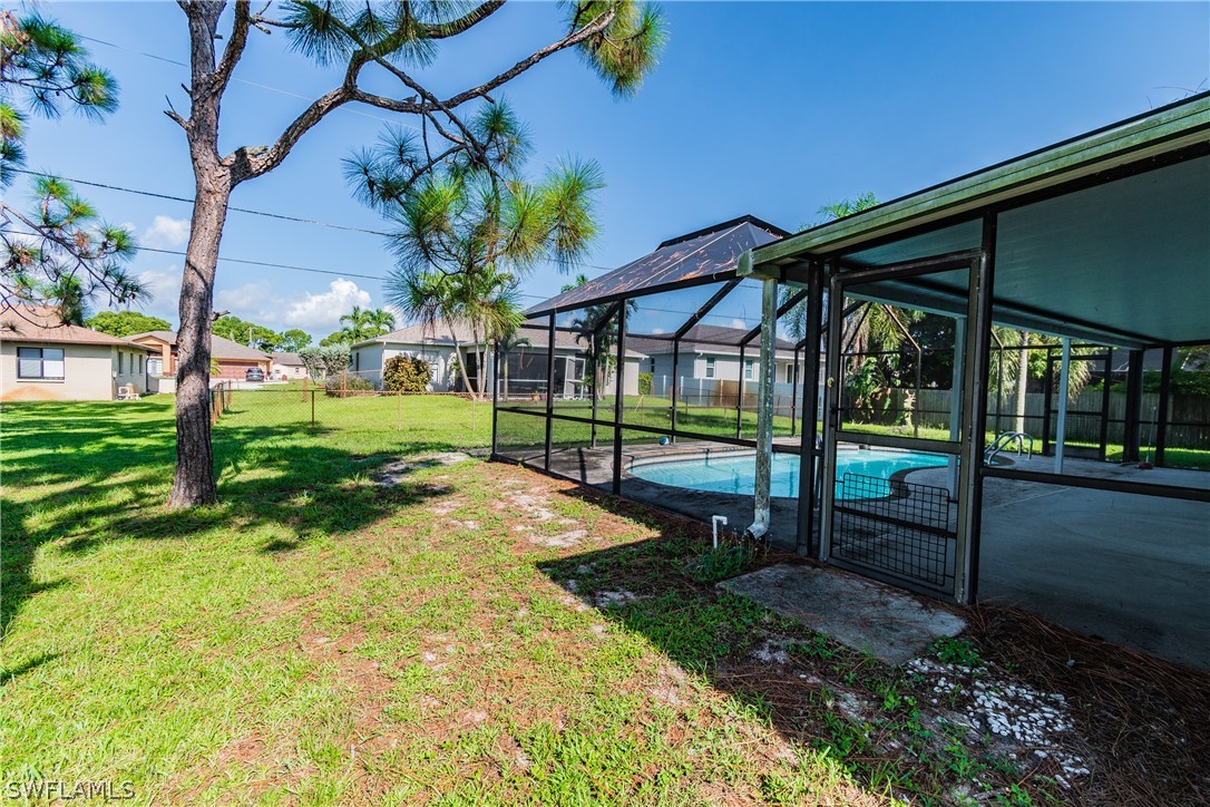 17552 Lebanon Road Fort Myers, FL 33967 - Photo 12 of 35 a view of a house with backyard and porch