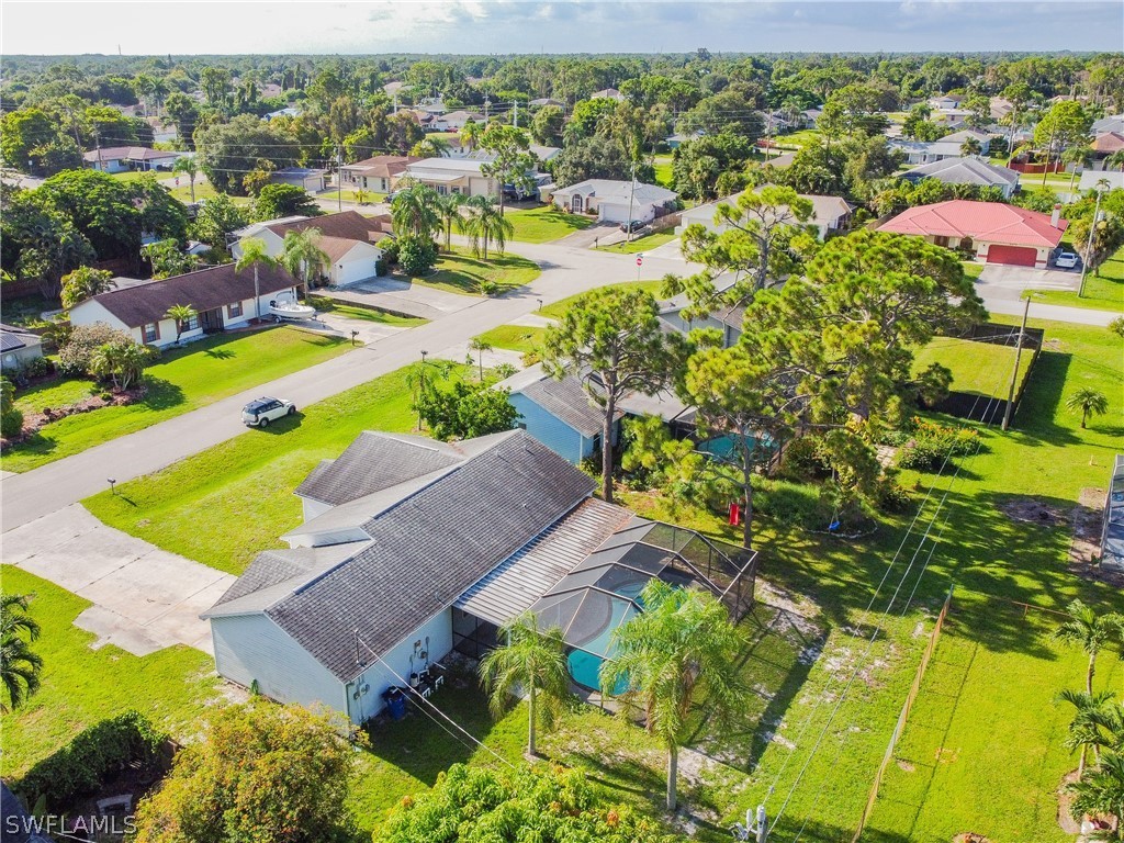 17552 Lebanon Road Fort Myers, FL 33967 - Photo 6 of 35 an aerial view of residential houses with outdoor space