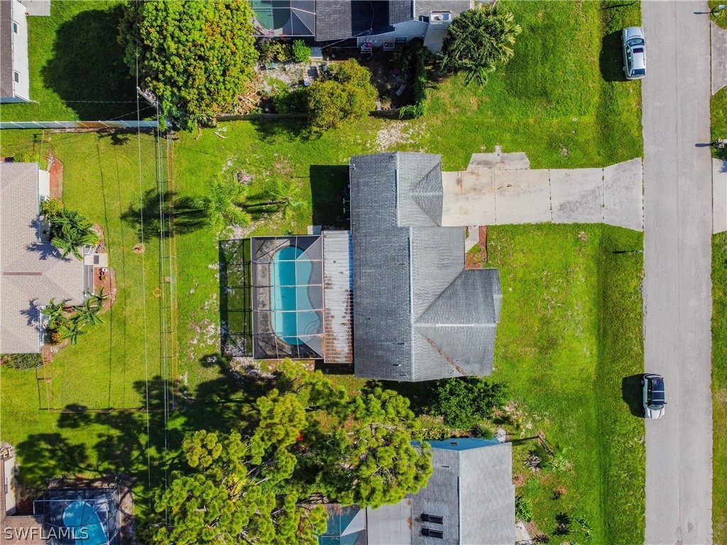 17552 Lebanon Road Fort Myers, FL 33967 - Photo 8 of 35 an aerial view of a house with a yard