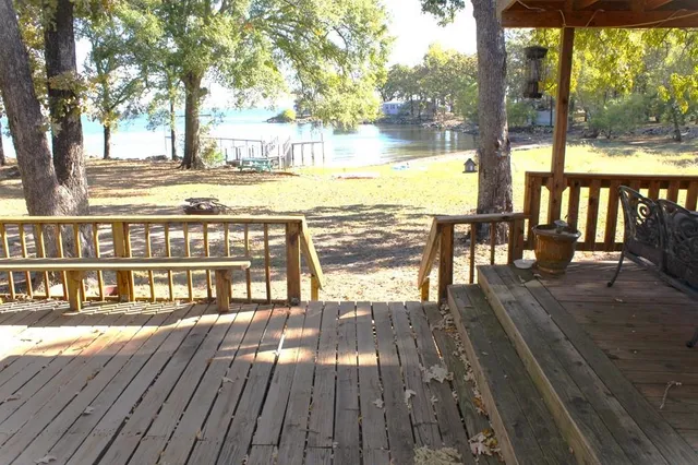 a view of a living room and wooden floor
