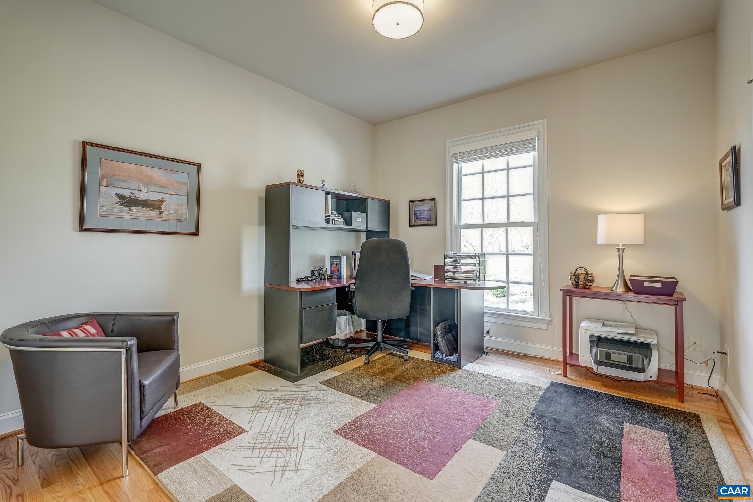 3434 Darby Road Keswick, VA 22947 - Photo 25 of 45 a view of a workspace with furniture and a window