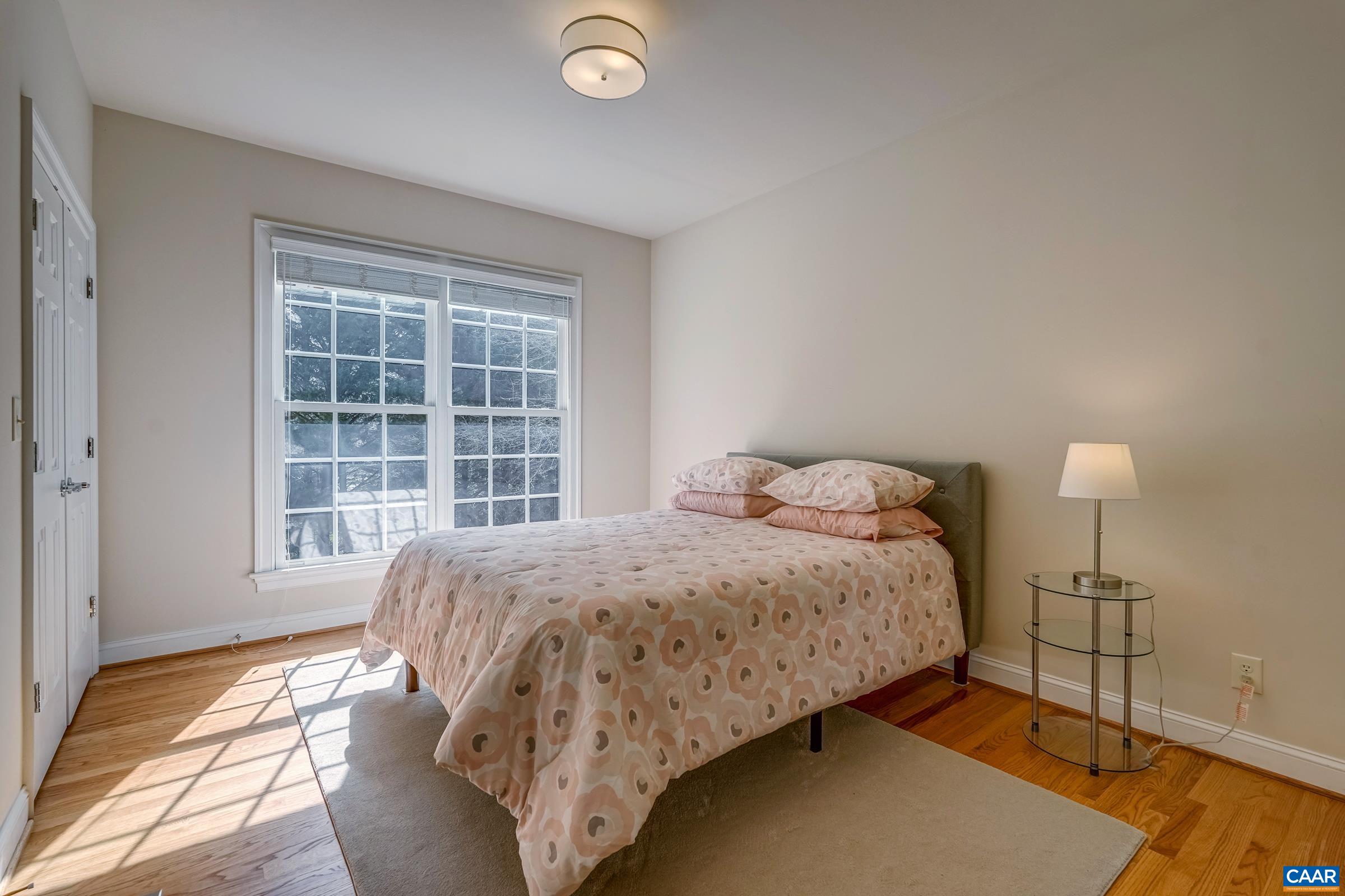 3434 Darby Road Keswick, VA 22947 - Photo 29 of 45 a bedroom with a bed and a window