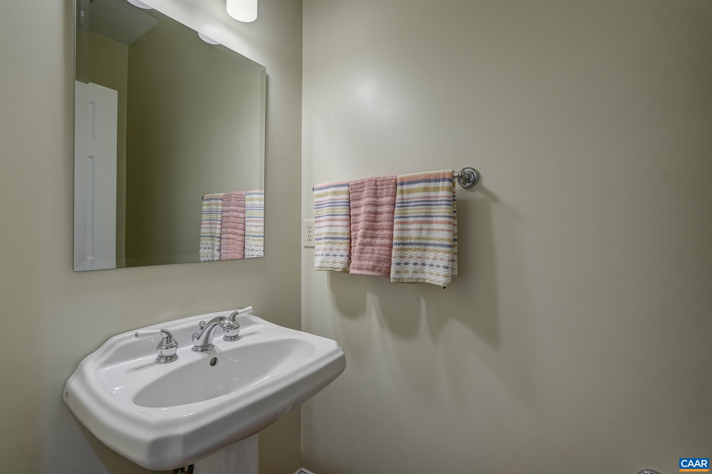3434 Darby Road Keswick, VA 22947 - Photo 36 of 45 a bathroom with a sink and a window