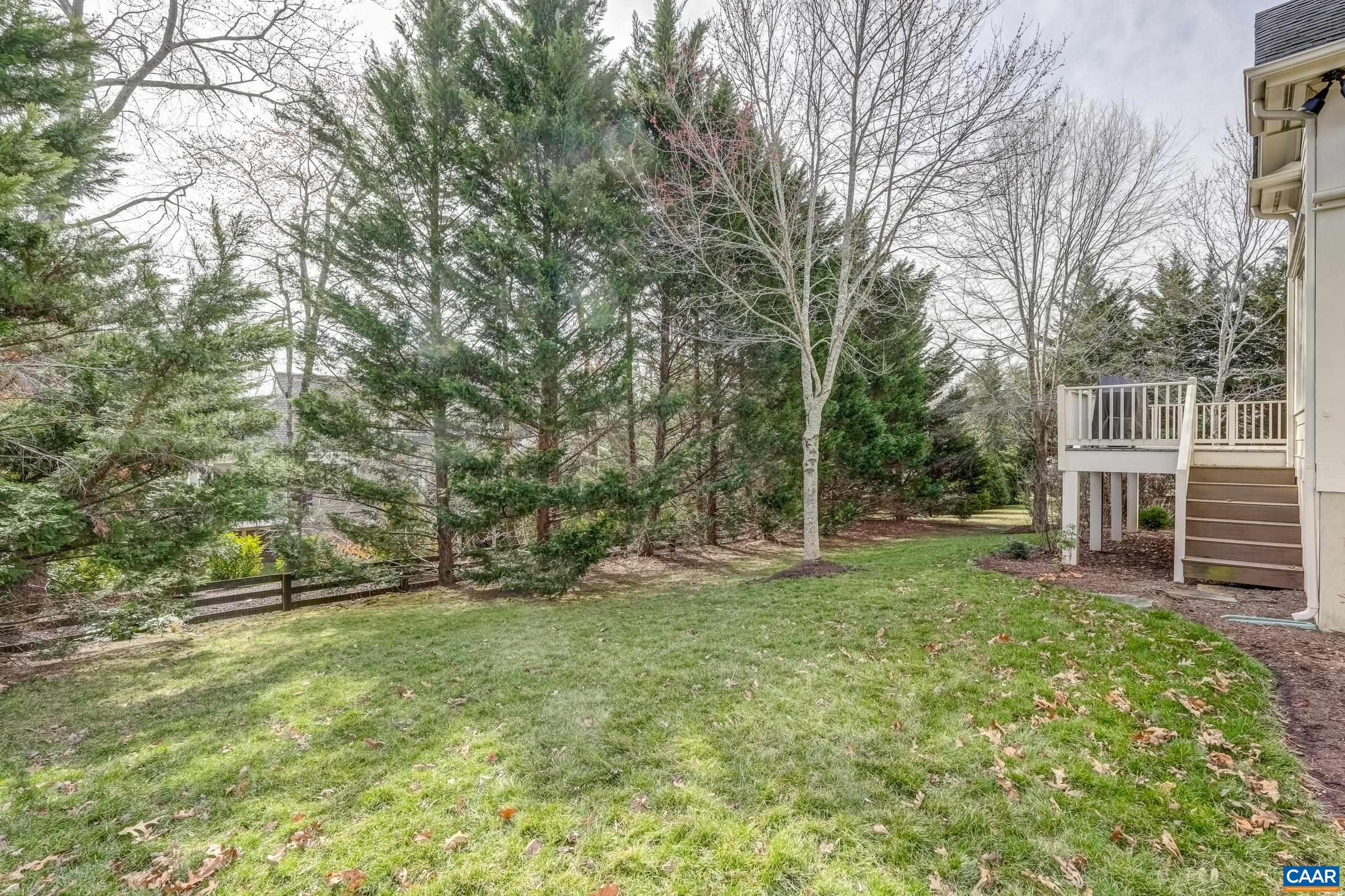 3434 Darby Road Keswick, VA 22947 - Photo 42 of 45 a view of a backyard with a large tree