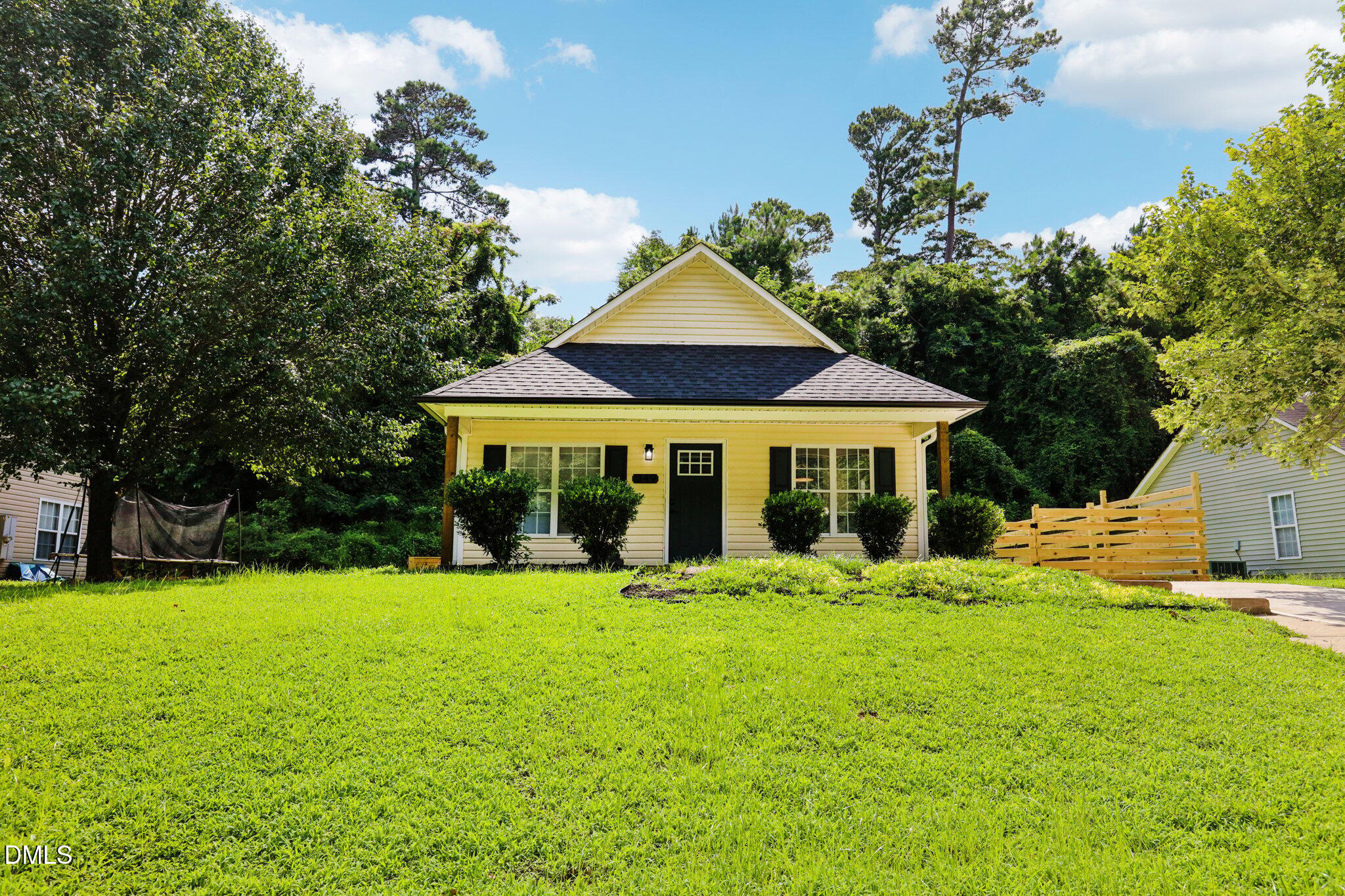 1349 Crabtree Boulevard Raleigh, NC 27610 - Photo 2 of 21 a view of a house with a yard and sitting area