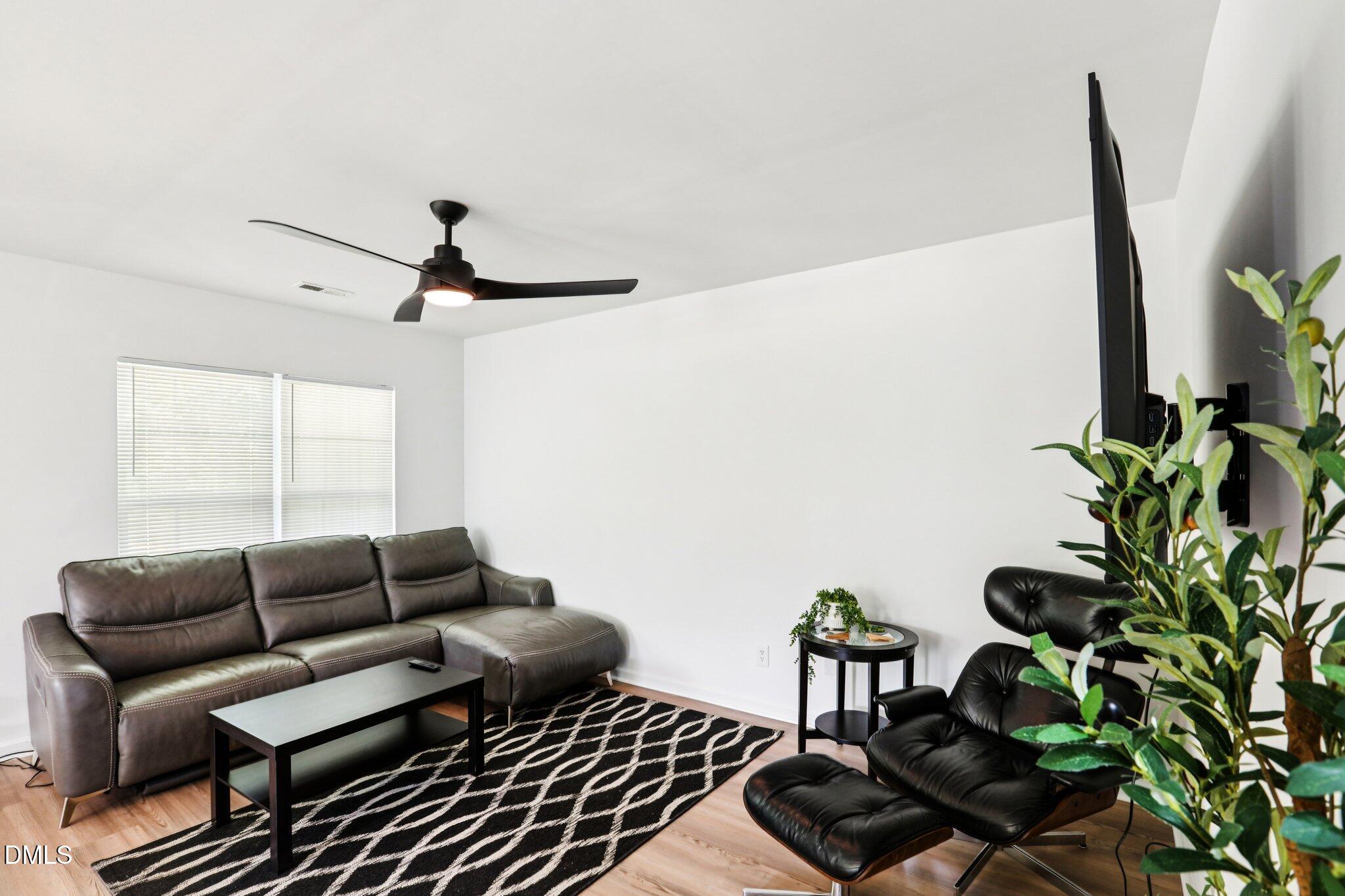 1349 Crabtree Boulevard Raleigh, NC 27610 - Photo 6 of 21 a living room with furniture