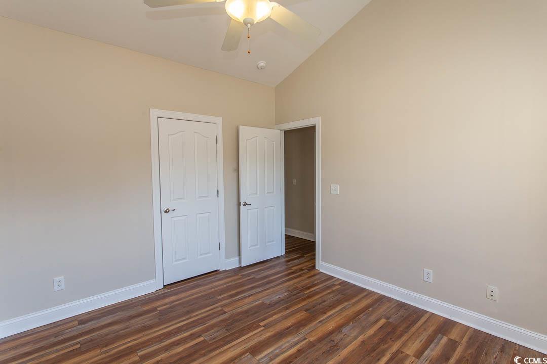 202 Sugar Mill Loop Myrtle Beach, SC 29588 - Photo 22 of 39 Unfurnished room with ceiling fan, dark wood-type