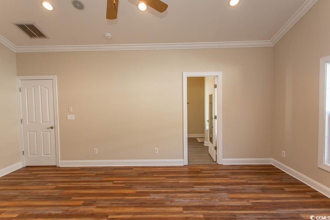 202 Sugar Mill Loop Myrtle Beach, SC 29588 - Photo 27 of 39 Spacious closet featuring hardwood / wood-style fl