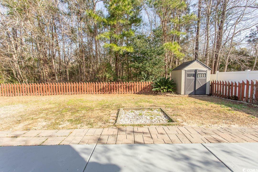 202 Sugar Mill Loop Myrtle Beach, SC 29588 - Photo 33 of 39 Washroom with dark hardwood / wood-style flooring,