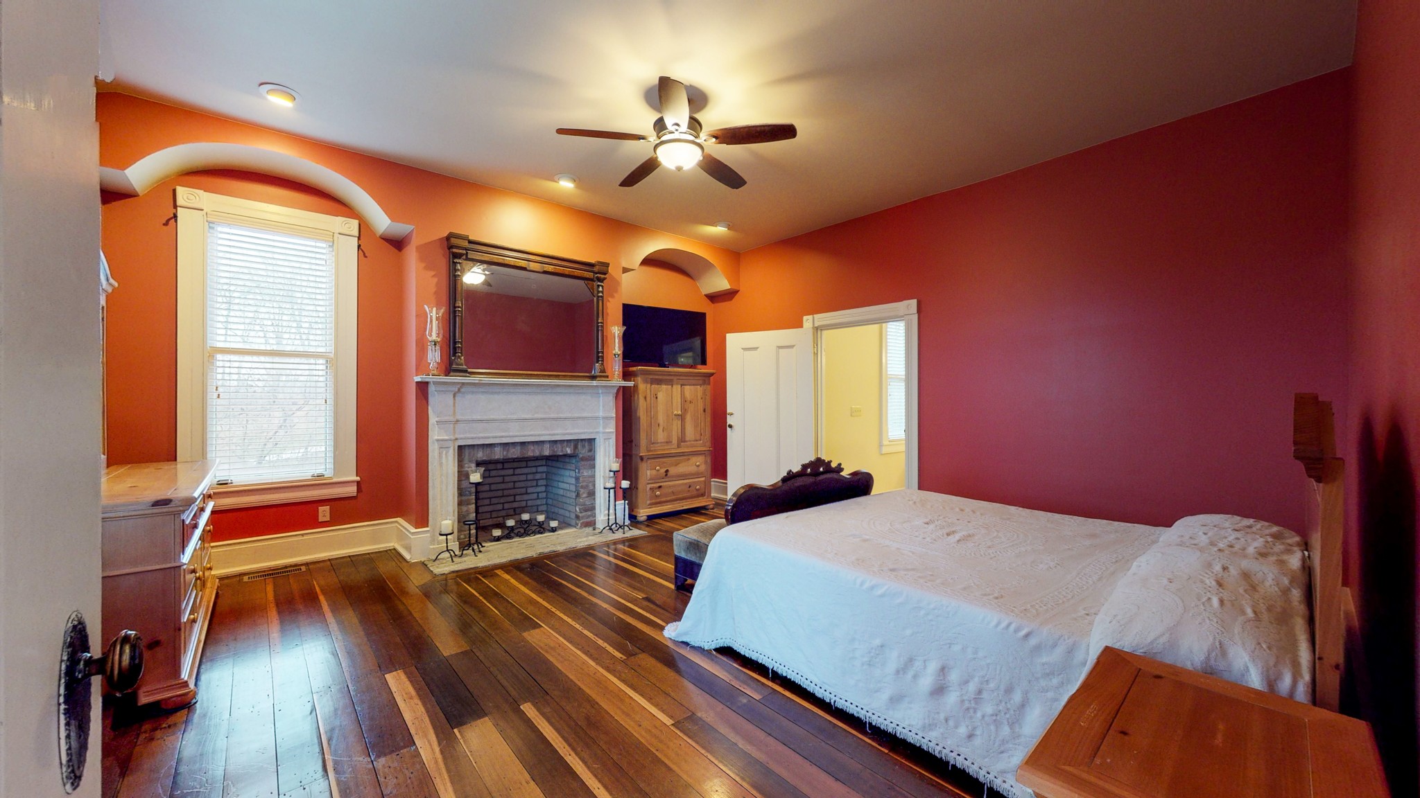 3527 Forest Park Road Springfield, TN 37172 - Photo 8 of 29 a bedroom with a bed and a fireplace