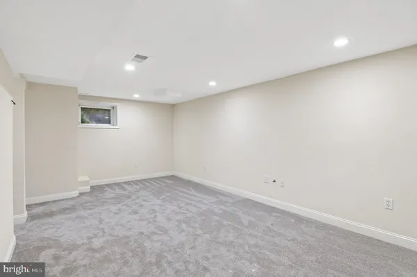 an empty room with a natural light