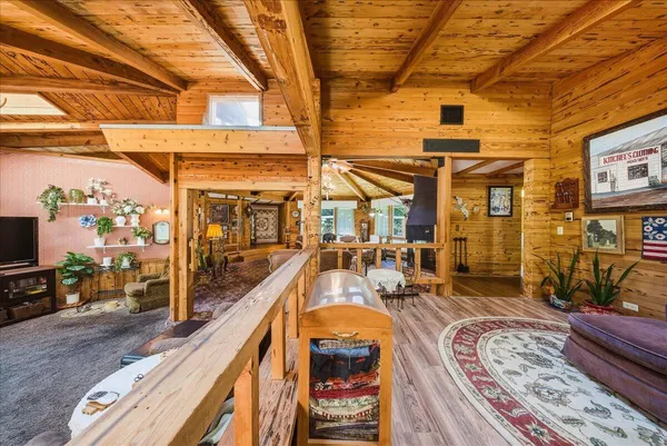 a view of a living room with furniture